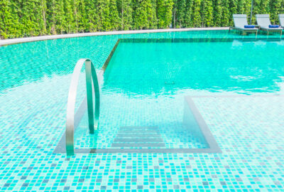 Beautiful luxury outdoor swimming pool in hotel resort - Filter Effect and Boost up color Processing